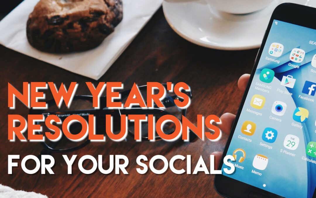 Title New Year's Resolutions for your social over a cafe settings with smartphone.